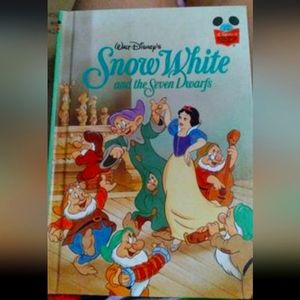 Snow White And The Seven Dwarfs , classic child book.